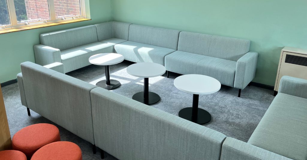 Modular seating sofas, configured in a corner sofa layout